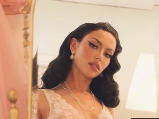 Burlesque performer expressing her boobs